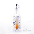 Glass oil bottle with plastic casing